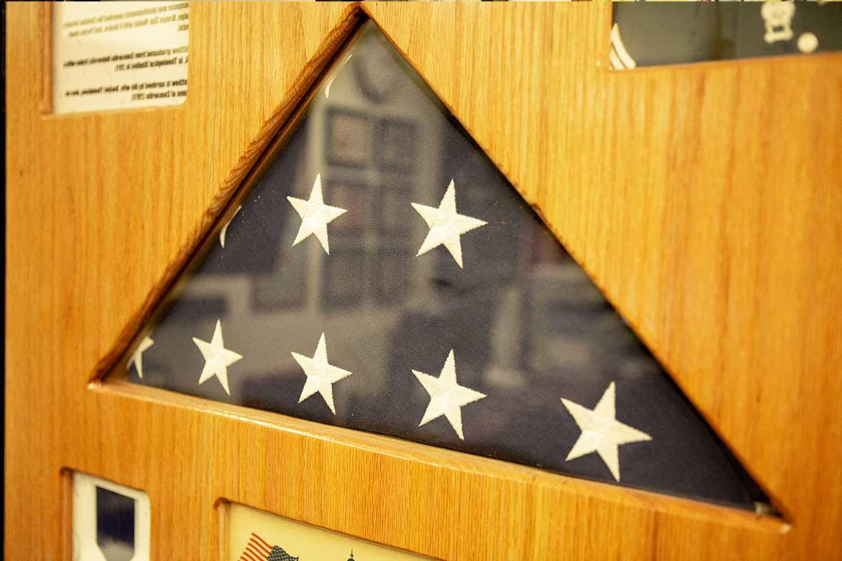 Folded American flag in a shadow box