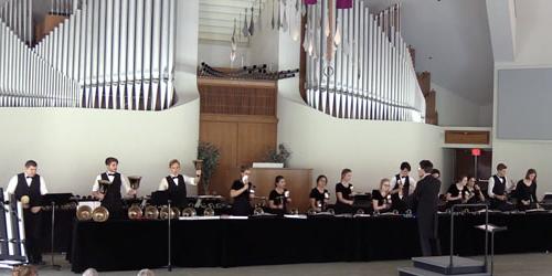 handbell performers in the CU center